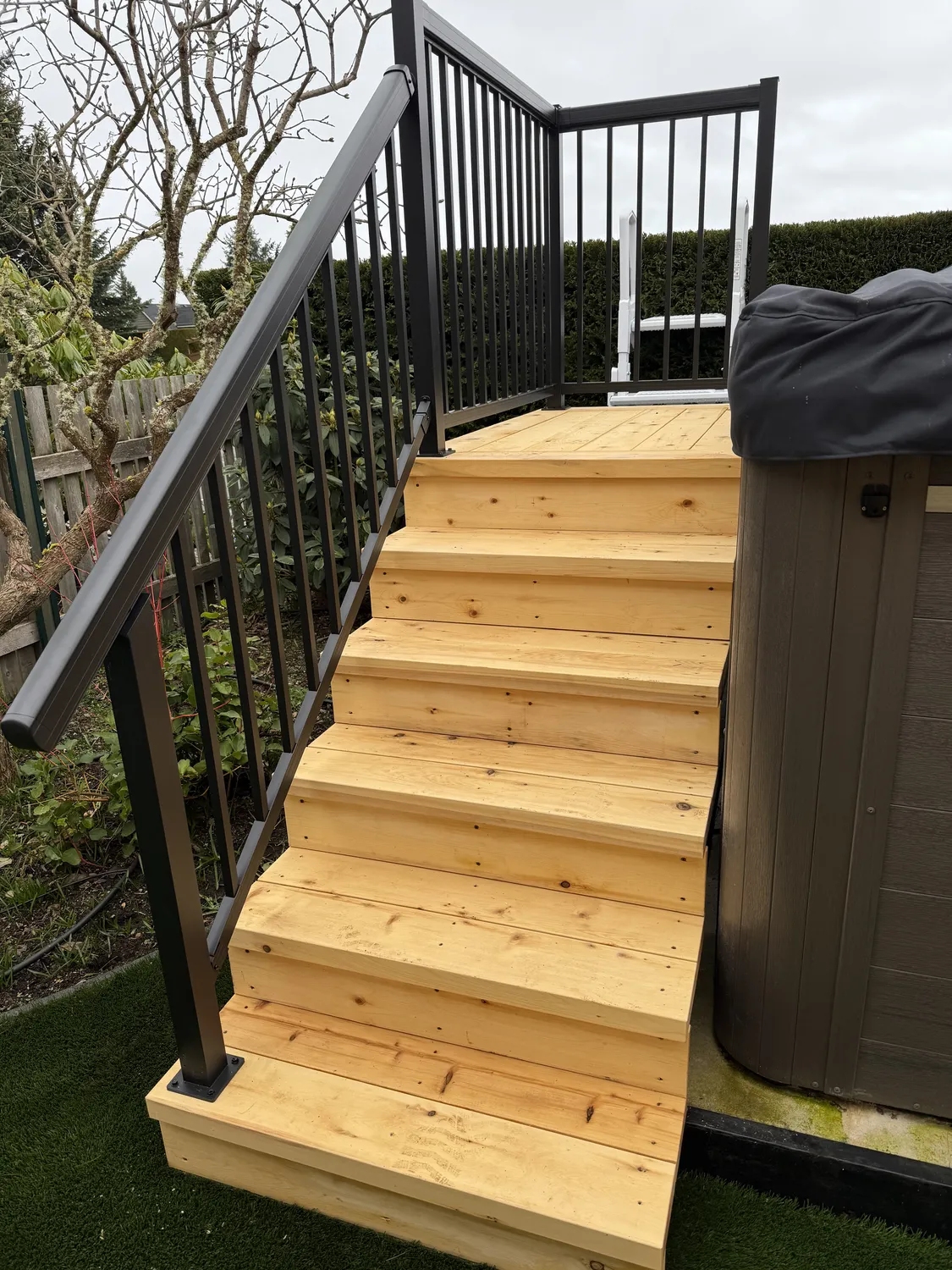 exterior staircase addition on to patio build, by Arama Building & Renovations in Qualicum Beach exterior staircase addition on to patio build, by Arama Building & Renovations in Qualicum Beach