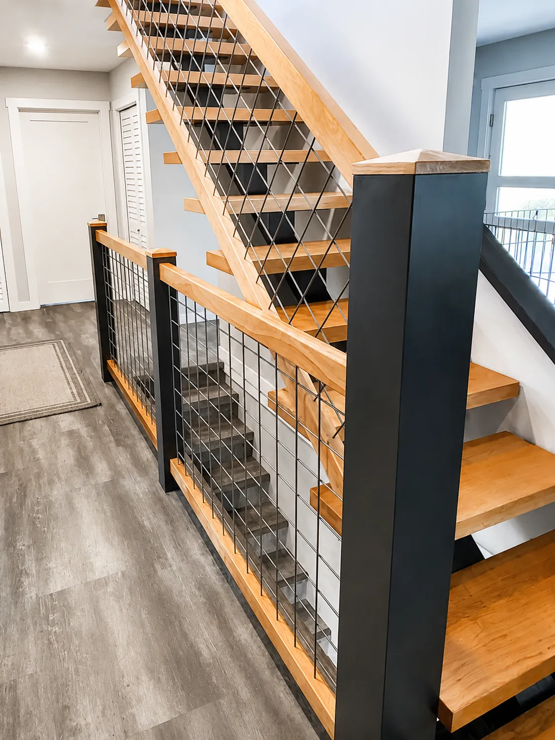 interior staircase renovation by Arama Building & Renovations in Qualicum Beach